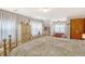 Spacious bedroom with white curtains, hardwood floors, and a cozy antique feel at 95 Plymouth Ave, Charleston, SC 29412