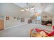 Spacious bonus room featuring dormered ceilings and a comfortable seating area at 95 Plymouth Ave, Charleston, SC 29412
