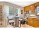 Eat in dining area with a quaint table set by a bright window at 95 Plymouth Ave, Charleston, SC 29412