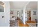 Bright and inviting living room with hardwood floors, arched doorways, and classic furnishings at 95 Plymouth Ave, Charleston, SC 29412