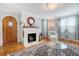 Cozy living room features a decorative fireplace, a comfortable chair and a plush decorative rug at 95 Plymouth Ave, Charleston, SC 29412