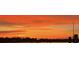 A mesmerizing sunset over the horizon with stunning vibrant colors at 95 Plymouth Ave, Charleston, SC 29412