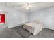Cozy bedroom with light blue walls, carpeting, ceiling fan, and a comfortable bed at 101 Danzid Dr, Summerville, SC 29483