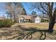 Tan home featuring a well-manicured lawn and a charming front entrance at 101 Danzid Dr, Summerville, SC 29483