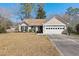 Charming single-story home with a 1-car garage, well-manicured landscaping, and a neatly kept lawn at 101 Danzid Dr, Summerville, SC 29483