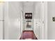 Bright hallway with white walls, wood flooring, and a clear view to the front door at 101 Danzid Dr, Summerville, SC 29483