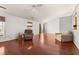 Open living room with hardwood floors, high ceilings, ceiling fan, and comfortable seating at 101 Danzid Dr, Summerville, SC 29483