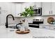 Bright kitchen featuring white cabinets, stainless steel appliances, and quartz countertops at 1020 Drakeford St # 9P, Saint George, SC 29477