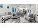 Open living space with living room, dining area, kitchen with island, and lots of natural light at 1020 Drakeford St # 9P, Saint George, SC 29477