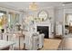 Comfortable living room featuring a modern fireplace and stylish decor with easy access to other rooms at 1022 House Finch Ave # Cc3-22-10P, Ravenel, SC 29470