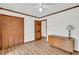 Bedroom featuring hardwood floors, ample closet space, and a dresser at 103 Night Hawk Ln, Summerville, SC 29485