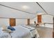 Comfortable bedroom featuring neutral tones, complemented by three wooden doors at 103 Night Hawk Ln, Summerville, SC 29485