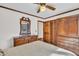Bedroom showing wooden furniture, including a dresser, mirror, cabinets, and closet space at 103 Night Hawk Ln, Summerville, SC 29485