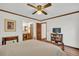 Bedroom showcasing an en-suite bathroom, a view of a television, and hardwood floors at 103 Night Hawk Ln, Summerville, SC 29485