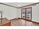 Bright bedroom with large windows, hardwood floors, and neutral decor at 103 Night Hawk Ln, Summerville, SC 29485