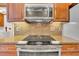 Modern kitchen showcasing stainless steel appliances, granite countertops, and custom cabinets at 103 Night Hawk Ln, Summerville, SC 29485