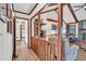 Open living room with wood beams, a bookcase, and comfortable furniture at 103 Night Hawk Ln, Summerville, SC 29485