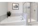 Luxurious bathroom with a deep soaking tub and a separate glass-enclosed shower at 1045 Northern Flicker Dr # Cc3-19-5P, Ravenel, SC 29470