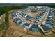 Wide angle overhead shot showcasing the colorful community homes and winding roads at 1050 Marsh Harrier Dr # Cc3-15-3P, Ravenel, SC 29470