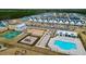 Overhead shot of amenities: a pool, a playground, tennis courts, and ample parking at 1050 Marsh Harrier Dr # Cc3-15-3P, Ravenel, SC 29470
