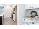 Bright and modern kitchen featuring white cabinets, stainless steel appliances, and granite countertops at 1050 Marsh Harrier Dr # Cc3-15-3P, Ravenel, SC 29470
