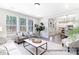 Spacious living room with open floor plan and views of the kitchen and backyard at 1050 Marsh Harrier Dr # Cc3-15-3P, Ravenel, SC 29470