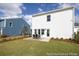 Well-maintained backyard featuring a patio, manicured lawn, and freshly landscaped flower beds at 1054 Marsh Harrier Dr # Cc3-15-5P, Ravenel, SC 29470