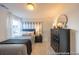 Well-lit bedroom with a unique, football-themed design, blending comfort and style at 1054 Marsh Harrier Dr # Cc3-15-5P, Ravenel, SC 29470