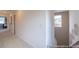 Upstairs hallway featuring neutral colors, carpeted floor, and natural light at 1054 Marsh Harrier Dr # Cc3-15-5P, Ravenel, SC 29470