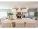 Spacious kitchen with a large island, stainless steel appliances, white cabinetry, and eat in seating at the counter at 1054 Marsh Harrier Dr # Cc3-15-5P, Ravenel, SC 29470