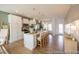 Stylish kitchen with island seating, stainless appliances and an open concept to the living room and access to the backyard at 1054 Marsh Harrier Dr # Cc3-15-5P, Ravenel, SC 29470