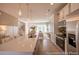 Open-concept kitchen with an island, stainless steel appliances, pendant lighting and views to the living room at 1054 Marsh Harrier Dr # Cc3-15-5P, Ravenel, SC 29470
