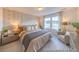 Inviting bedroom featuring decorative wallpaper and natural light from the windows at 1054 Marsh Harrier Dr # Cc3-15-5P, Ravenel, SC 29470