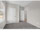 This bedroom has neutral walls, carpet, and two closets at 1056 Marsh Harrier Dr # Cc3-15-6P, Ravenel, SC 29470