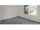 This bedroom has neutral walls, carpet, and two windows at 1056 Marsh Harrier Dr # Cc3-15-6P, Ravenel, SC 29470