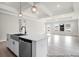 Kitchen island featuring a stainless steel dishwasher and sink at 1056 Marsh Harrier Dr # Cc3-15-6P, Ravenel, SC 29470