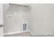 The laundry room offers hook-ups and shelving at 1056 Marsh Harrier Dr # Cc3-15-6P, Ravenel, SC 29470