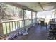 Covered back porch offering a seating area with views of the backyard at 106 Harriet Tubman Ln, Moncks Corner, SC 29461