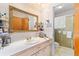 Bright bathroom with a vanity, ample counter space, and a glass-enclosed shower at 1060 Yeamans Hall Rd, Hanahan, SC 29410