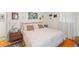 Serene bedroom with hardwood floors, neutral walls, and a comfortable bed with plush pillows at 1060 Yeamans Hall Rd, Hanahan, SC 29410