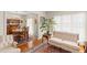 Open-concept living and dining area with hardwood floors and natural light at 1060 Yeamans Hall Rd, Hanahan, SC 29410