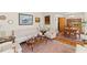 Cozy living room showcasing traditional furnishings and hardwood floors at 1060 Yeamans Hall Rd, Hanahan, SC 29410