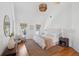Cozy bedroom with a large bed, natural light from windows, and stylish decor at 118 Freeman St, Mount Pleasant, SC 29464