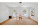 Bedroom features hardwood floors, white walls, and natural light at 118 Freeman St, Mount Pleasant, SC 29464