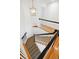 Elegant staircase with wooden treads, carpet runner and white railing at 118 Freeman St, Mount Pleasant, SC 29464