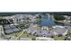 Aerial view of community featuring a lake, clubhouse, tennis courts and pool at 125 Leeward Landing, Summerville, SC 29486