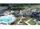 Aerial view of community amenities, including a pool and building with manicured grounds at 125 Leeward Landing, Summerville, SC 29486
