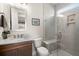 Modern bathroom features updated vanity and large walk-in shower with bench and tile surround at 125 Leeward Landing, Summerville, SC 29486