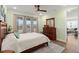Comfortable bedroom features a ceiling fan, neutral walls, and large windows for natural light at 125 Leeward Landing, Summerville, SC 29486