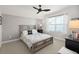 Cozy bedroom featuring a decorative headboard, neutral walls, and bright window for natural light and comfort at 125 Leeward Landing, Summerville, SC 29486